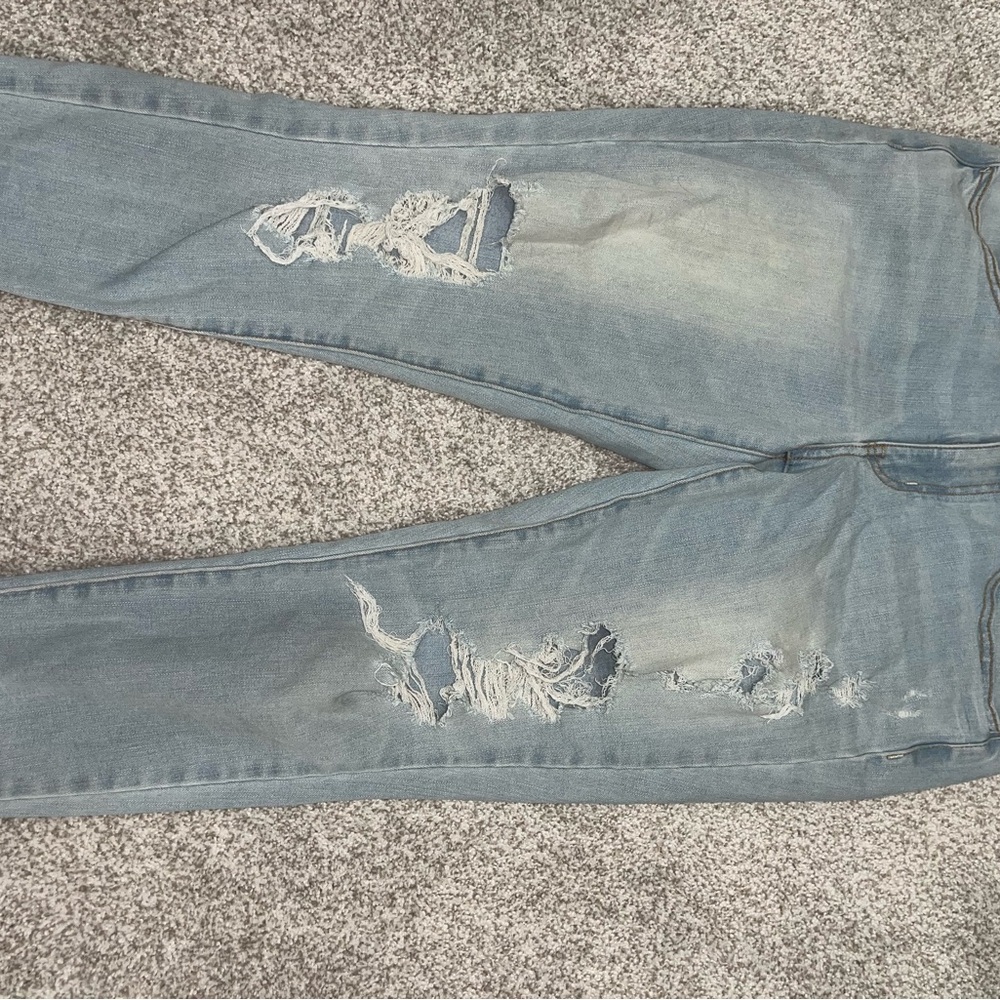 Distressed Light Blue Jeans